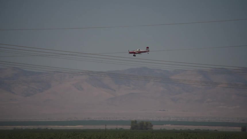 An airplane flying through the air