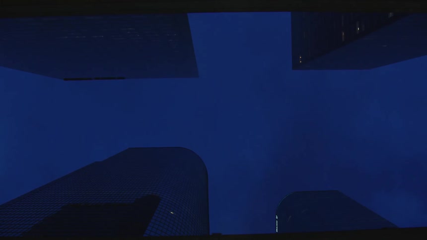 The sky is dark above the buildings