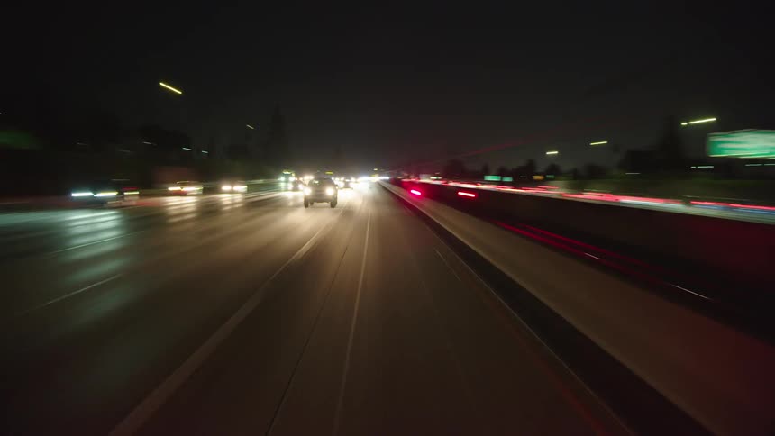 Time lapse of cars driving down a highway