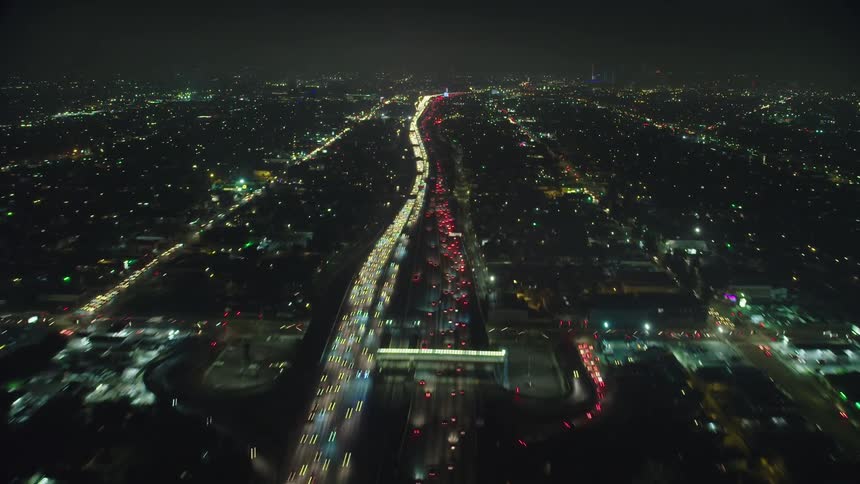 Time lapse of traffic in a busy city at night