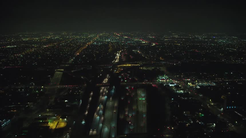 An aerial view of a downtown city is displayed