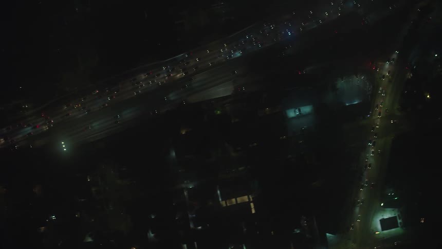 A highway with vehicles at nighttime