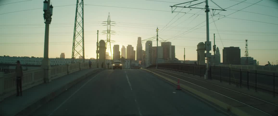 A car drives down the road