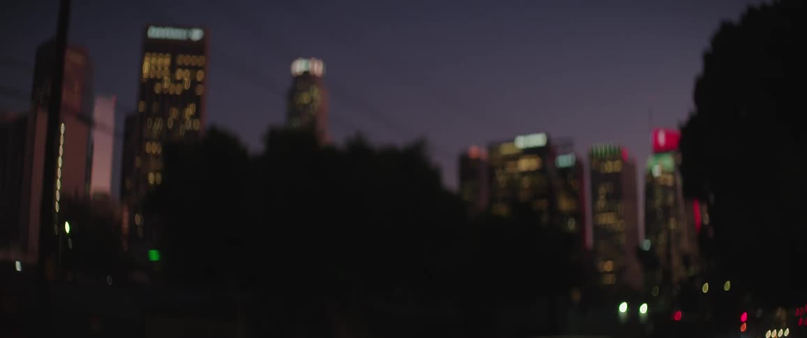Out of focus city skyline at night