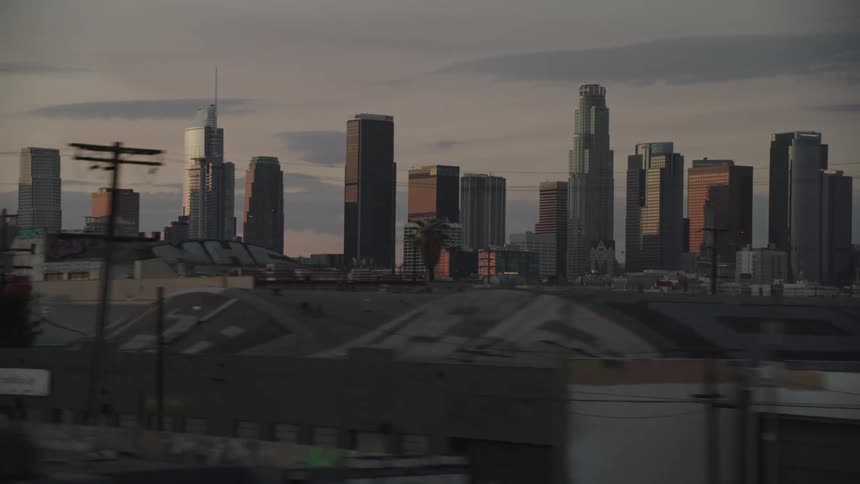 Skyline of the city with tall buildings and skyscrapers at dawn