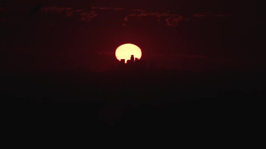 The full moon glows in the night sky