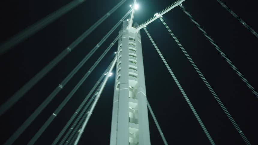 Cars driving across a bridge