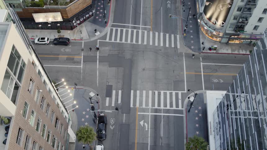 An intersection in a metropolis during the day