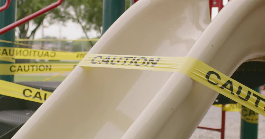 Caution tape closing off a playground