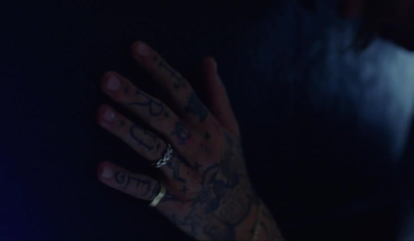A hand against the wall