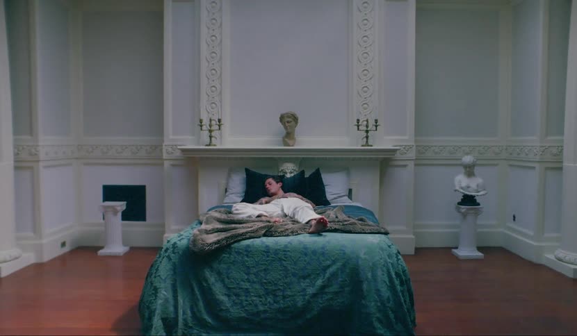 A man laying in bed sleeping