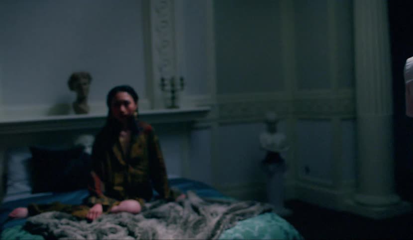 A person sits on the bed