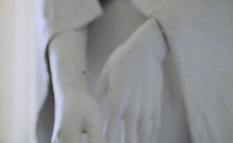 Artistic white sculpture hands in the room