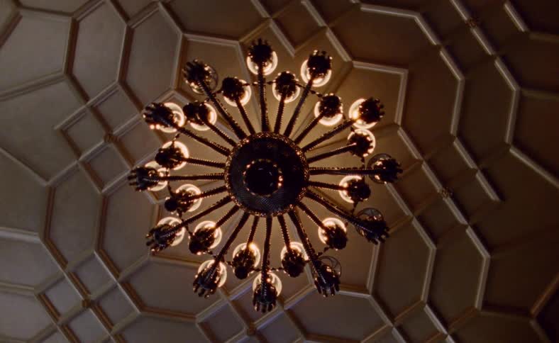 Luxury interior chandelier hangs on the ceiling