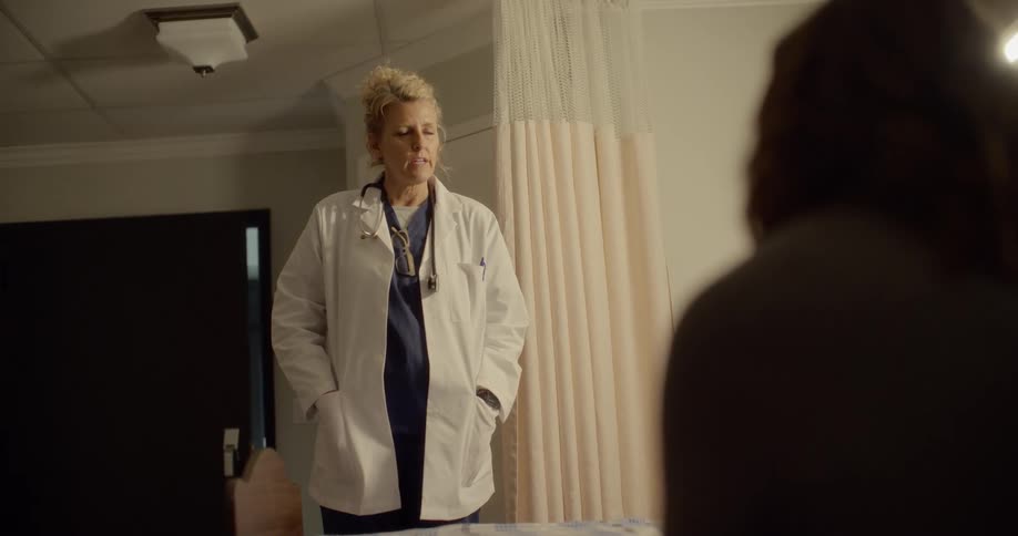 A doctor talks to a patient
