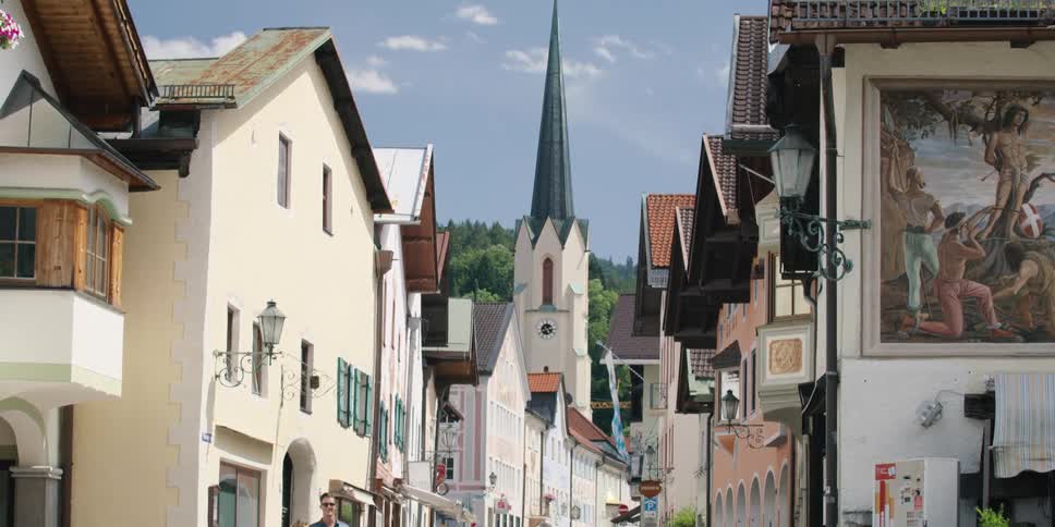 People travel down the street in town