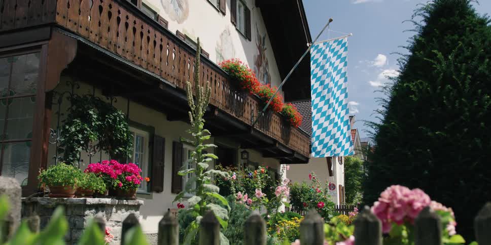 A house surrounded by flowers