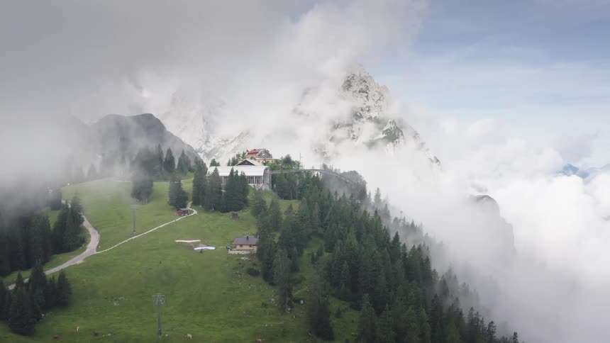 Buildings nestled among mountains