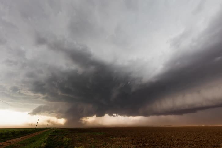 Time lapse of a storm clouds and a tornado touching down