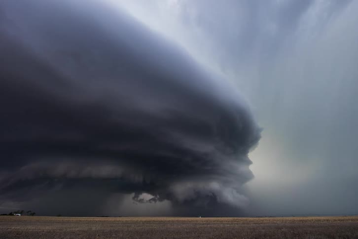 Dark stormy clouds gather over the dry plains