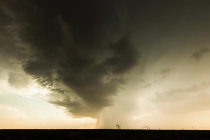 Storm clouds over a wind farm