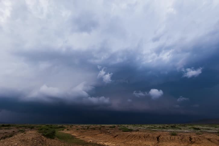 A desert with the sky above