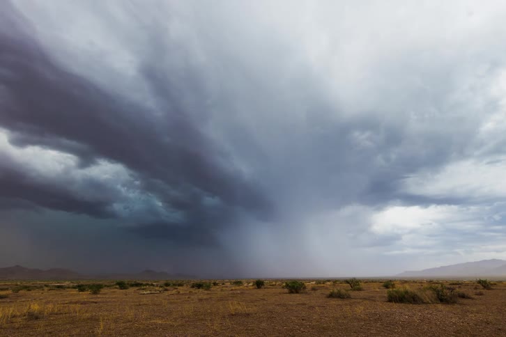 Storm clouds are forming in the sky