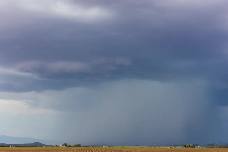 Storm clouds moving across the land