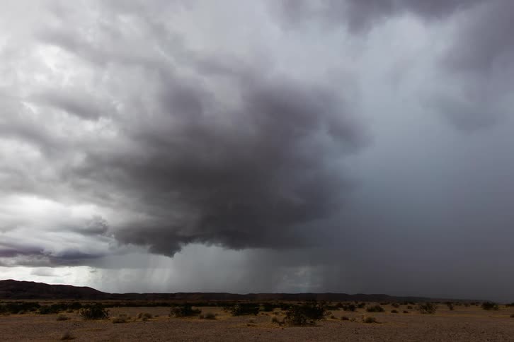 Time lapse of storm clouds moving across the land