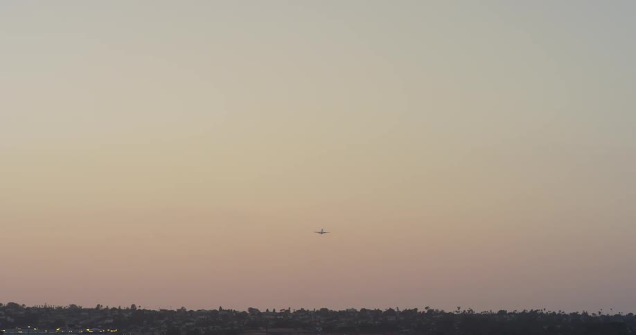 An airplane flies in the sky