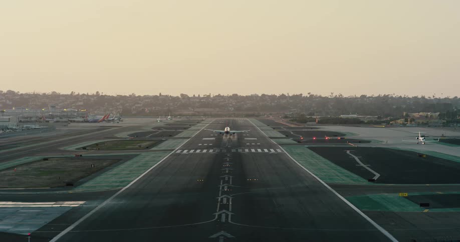 The airplane lands on the runway