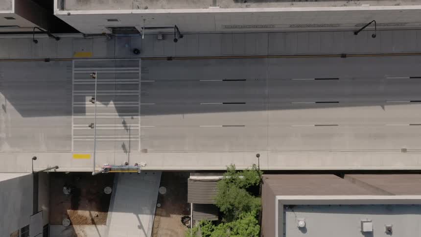 A completely empty four lane highway through the city