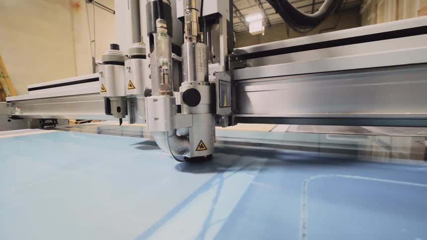 Router machine cuts materials in a warehouse