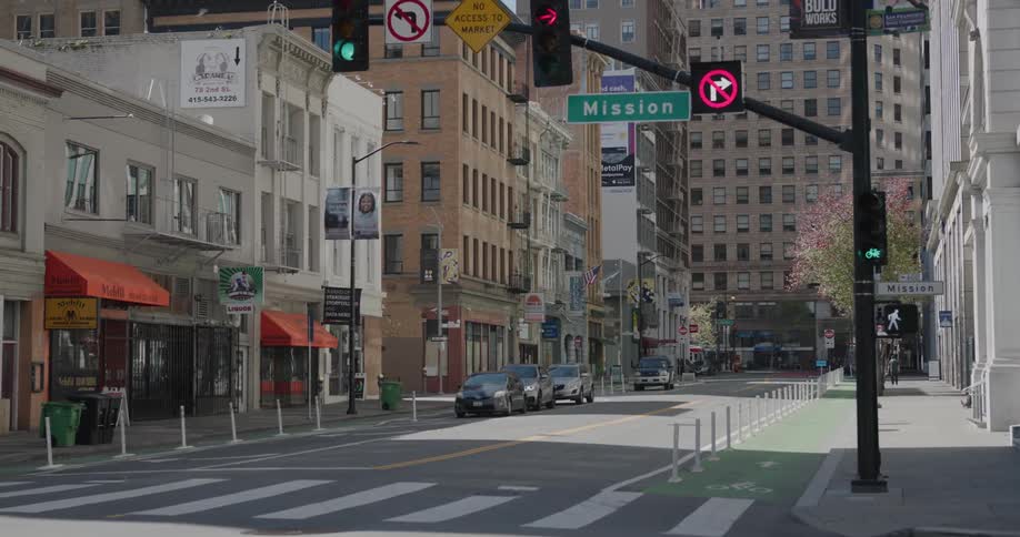 An intersection in a metropolis during the day