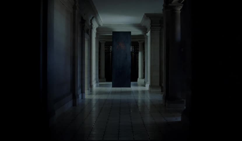 A hallway appears dark