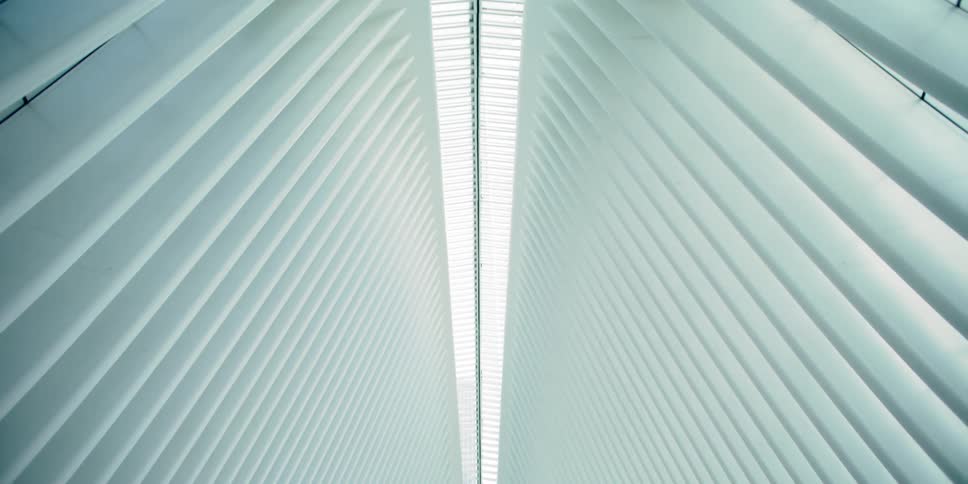 Beams dramatically slant up toward high ceiling