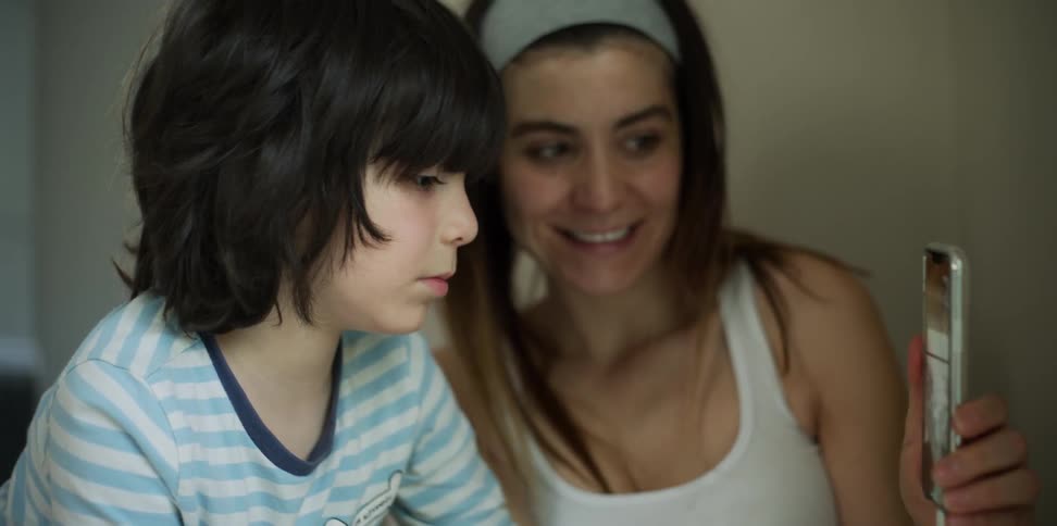Two siblings talk over the phone
