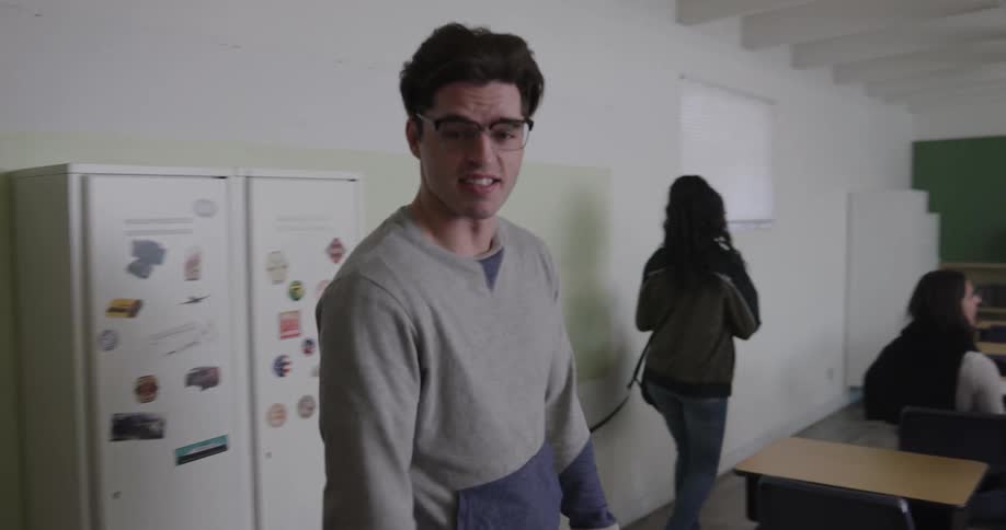 Students walk into a classroom