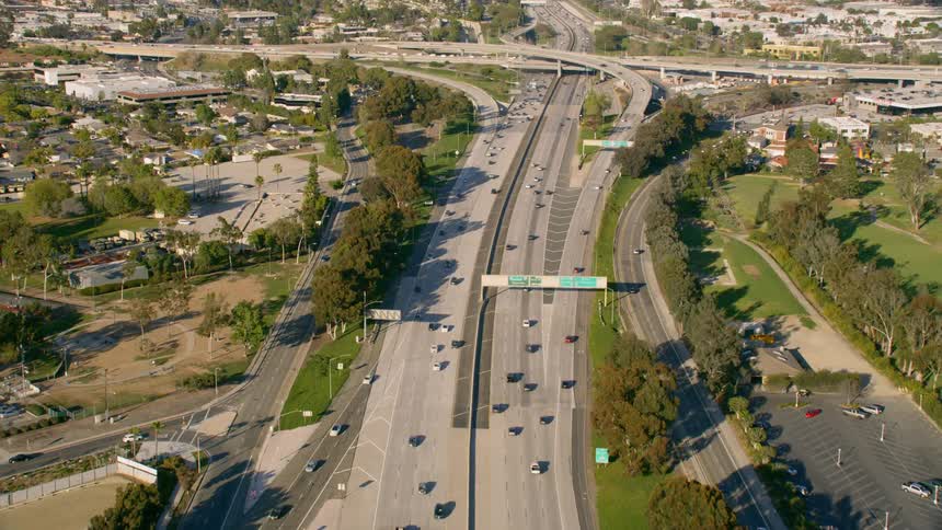 Aerial of daily commute on freeway in an urban area