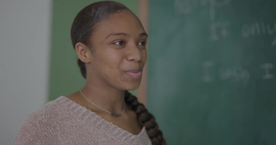 A student talking to a teacher