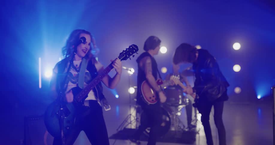 A band performs in an empty room