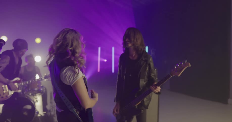 A band plays on stage