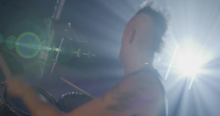 A drummer performs on stage