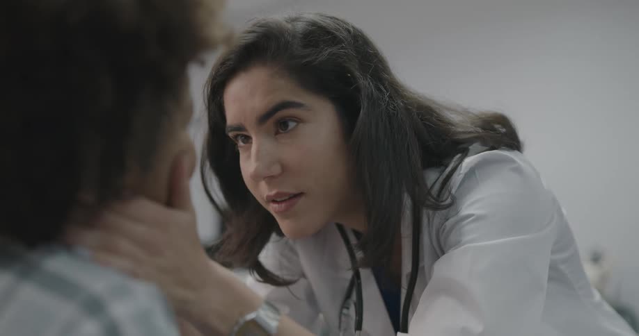 The doctor checks over the boy