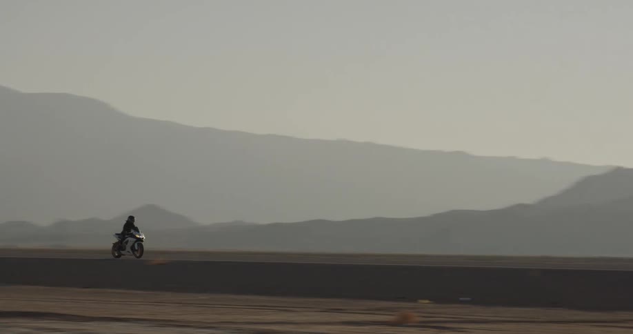 A motorbike driving down a highway