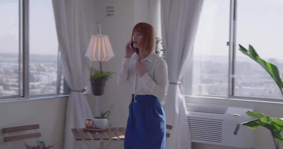 A woman talking on a phone