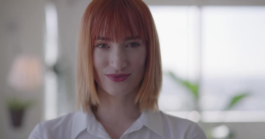 A woman is smiling