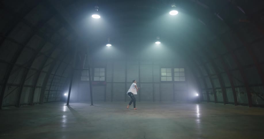 A man doing a jumping grand pirouette