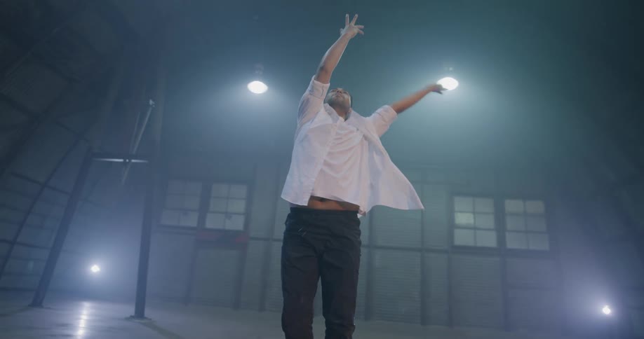 Dancers performs dance moves on stage