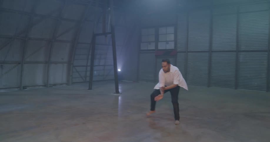 Dancer performs dance moves on stage